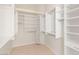 Walk-in closet with built-in shelving and hanging rods, providing ample storage at 10548 Findlay Ave, Las Vegas, NV 89134