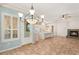 Open dining room space with direct kitchen access and door to the backyard at 10548 Findlay Ave, Las Vegas, NV 89134