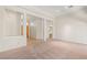 Open concept living room flows into the foyer and features tile flooring, and bright light at 10548 Findlay Ave, Las Vegas, NV 89134