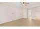 Spacious main bedroom with a modern ceiling fan and views of the bathroom and closet at 10548 Findlay Ave, Las Vegas, NV 89134