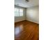 Cozy bedroom with natural lighting and bamboo hardwood floors at 11404 Belmont Lake Dr # 103, Las Vegas, NV 89135