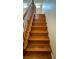 Staircase has hardwood steps with wooden railing at 11404 Belmont Lake Dr # 103, Las Vegas, NV 89135