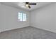 A move-in ready bedroom features carpeted floors, neutral walls, and ceiling fan at 220 Mission Catalina Ln # 208, Las Vegas, NV 89107