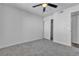 Bedroom boasts ceiling fan, and neutral carpet, and white walls at 220 Mission Catalina Ln # 208, Las Vegas, NV 89107
