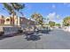 The secure gated entrance to the Meadows community is well landscaped at 220 Mission Catalina Ln # 208, Las Vegas, NV 89107