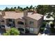 Charming multi-level home showcasing architectural details and well-maintained landscaping at 220 Mission Catalina Ln # 208, Las Vegas, NV 89107