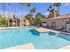 Enjoy the community pool with plenty of seating and shade from mature palm trees at 220 Mission Catalina Ln # 208, Las Vegas, NV 89107