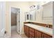 Bathroom featuring double sinks and separate toilet area at 2279 Pacini Ct, Henderson, NV 89052
