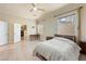 Bright bedroom with natural light, closet, and a ceiling fan at 2279 Pacini Ct, Henderson, NV 89052