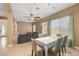 Open concept living area with tile flooring, plenty of natural light and stylish furnishings at 2279 Pacini Ct, Henderson, NV 89052