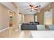 Open-concept living area with tile flooring, natural light and stylish furnishings at 2279 Pacini Ct, Henderson, NV 89052