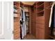 Well-organized walk-in closet with custom shelving and ample storage space at 2279 Pacini Ct, Henderson, NV 89052