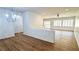 Bright living room featuring hardwood floors, neutral walls, and modern lighting fixtures at 2535 Jada Dr, Henderson, NV 89044