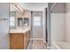 Bathroom with a vanity, mirror and a bathtub at 262 Calvino Ave, Las Vegas, NV 89183