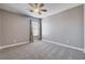 Bedroom featuring carpeted floors and a window with curtains at 262 Calvino Ave, Las Vegas, NV 89183
