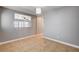 Flex room or office space features tiled flooring, bright natural lighting, and view to living area at 262 Calvino Ave, Las Vegas, NV 89183