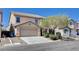 Attractive two-story home with a two-car garage and a tile roof at 262 Calvino Ave, Las Vegas, NV 89183