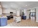 Beautiful open kitchen with stainless appliances and island, connecting to the staircase at 262 Calvino Ave, Las Vegas, NV 89183