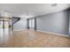 Spacious living room with tile flooring, recessed lights, and ample natural light at 262 Calvino Ave, Las Vegas, NV 89183