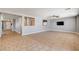 Neutral open floor plan, with tile floors, leading to the front entryway and other rooms at 262 Calvino Ave, Las Vegas, NV 89183