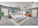 Spacious main bedroom featuring stylish decor, a ceiling fan, and lots of natural light at 262 Calvino Ave, Las Vegas, NV 89183