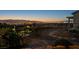 Backyard with a view of the city lights and mountain range at 2899 Brook Trout Ct, Henderson, NV 89052