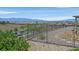 Expansive backyard view featuring desert landscape and mountain views at 2899 Brook Trout Ct, Henderson, NV 89052