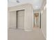 Bedroom features a mirrored closet, carpet flooring, neutral walls and an ensuite bath at 2899 Brook Trout Ct, Henderson, NV 89052