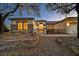Charming home exterior with stone accents, desert landscaping, and welcoming entrance at 2899 Brook Trout Ct, Henderson, NV 89052