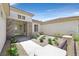Inviting entrance with stone details, a well-manicured yard and attractive walkway at 2899 Brook Trout Ct, Henderson, NV 89052