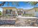 Beautiful desert landscaping surrounds this lovely home with stone accents and walkway at 2899 Brook Trout Ct, Henderson, NV 89052