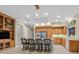 Well-appointed kitchen featuring an island with bar seating, stainless appliances and custom cabinetry at 2899 Brook Trout Ct, Henderson, NV 89052