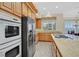 Kitchen with stainless appliances, granite counters, and plenty of cabinets at 2899 Brook Trout Ct, Henderson, NV 89052