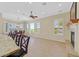 Bright and airy kitchen with granite countertops, built in fireplace, and a breakfast bar at 2899 Brook Trout Ct, Henderson, NV 89052