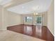 Spacious living room featuring hardwood floors, recessed lighting, and large windows at 2899 Brook Trout Ct, Henderson, NV 89052