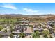A well-maintained home featuring solar panels and a two-car garage, nestled in a desert community at 3 Vicolo Sebino, Henderson, NV 89011