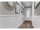 Bright hallway with decorative wall paneling and modern accents at 3 Vicolo Sebino, Henderson, NV 89011