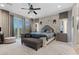 A spacious primary bedroom suite includes outdoor access, a sitting area, and a large tufted headboard at 3 Vicolo Sebino, Henderson, NV 89011
