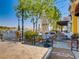 Charming outdoor dining area at Mimi & Coco Bistro with tables overlooking the water at 3 Vicolo Sebino, Henderson, NV 89011