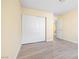 Bedroom featuring a closet with sliding doors and light-colored wood flooring at 3151 Soaring Gulls Dr # 1066, Las Vegas, NV 89128