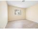 Bedroom featuring a window with blinds and light-colored wood flooring at 3151 Soaring Gulls Dr # 1066, Las Vegas, NV 89128