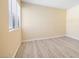Bedroom with light-colored wood flooring and a window with blinds at 3151 Soaring Gulls Dr # 1066, Las Vegas, NV 89128