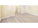 Hallway featuring light-colored wood flooring and several white doors at 3151 Soaring Gulls Dr # 1066, Las Vegas, NV 89128