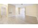 Bright living room with laminate floors, neutral paint, and a sliding glass door at 3151 Soaring Gulls Dr # 1066, Las Vegas, NV 89128
