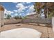 Low maintenance backyard with gravel, block wall, and built-in seating at 317 Brent Ct, Henderson, NV 89074