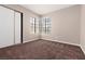 Bedroom with window for natural light and sliding door closet for storage at 317 Brent Ct, Henderson, NV 89074