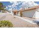 Front exterior view of house with desert landscaping leading to the entrance at 317 Brent Ct, Henderson, NV 89074