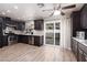 Stylish kitchen features stainless steel appliances and sliding glass door at 317 Brent Ct, Henderson, NV 89074