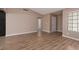 Expansive living room with wood floors and neutral wall paint at 317 Brent Ct, Henderson, NV 89074