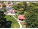 Aerial view of the community park featuring lush greenery, walking paths, covered gazebo, and convenient restroom facilities at 317 Brent Ct, Henderson, NV 89074